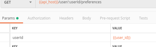 Postman Params tab showing the userId route parameter set to the user_id environment variable